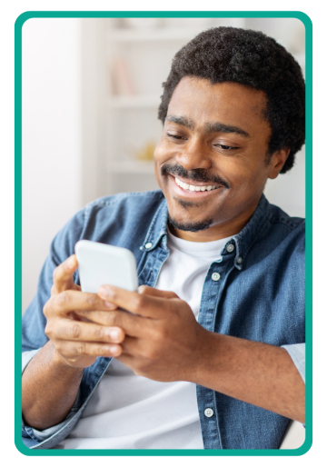 a man looking at a mobile phone